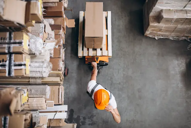 Al Ayat warehouse stocked with boxed goods ready for dispatch