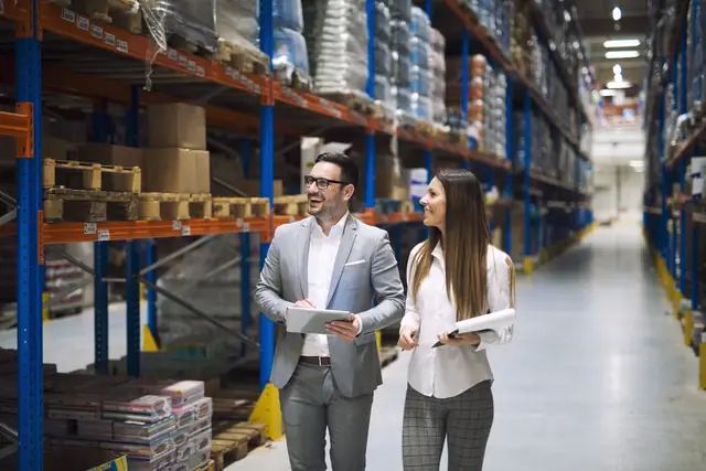 Al Ayat warehouse team discussing logistics and distribution